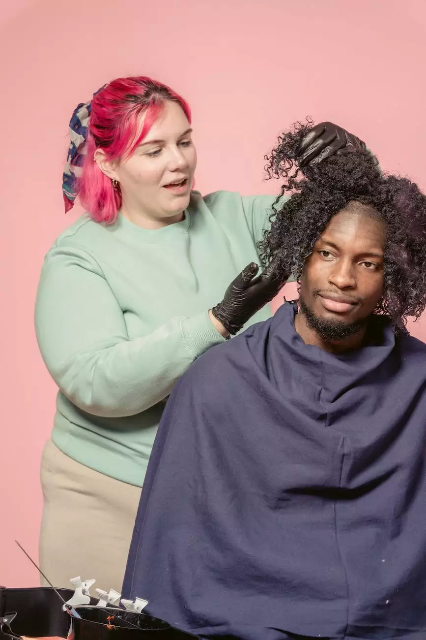 Curly hair being sectioned during styling